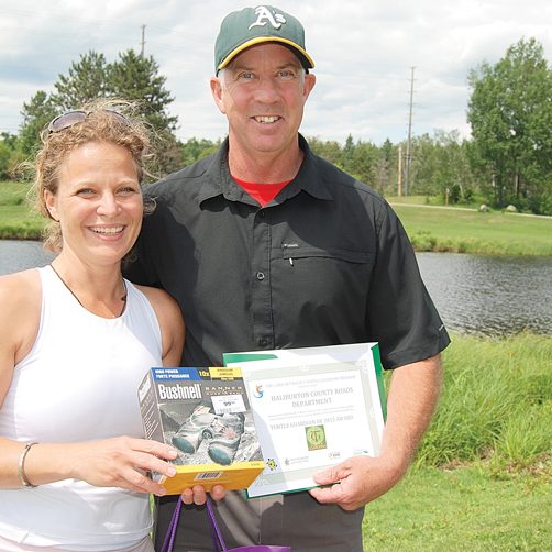 Leora Berman, CMO of The Land Between, presented a Turtle Guardian certificate to Brian Mulholland, engineering assistant for the County of Haliburton, on June 24, 2015. JENN WATT Staff